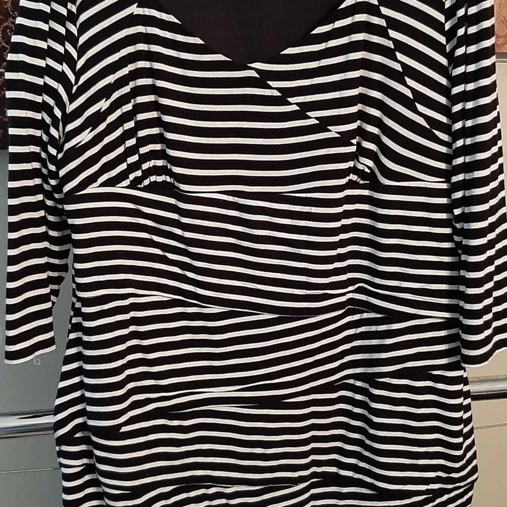 Cuu-te and classy black and white midi dress with figure flattering ruching